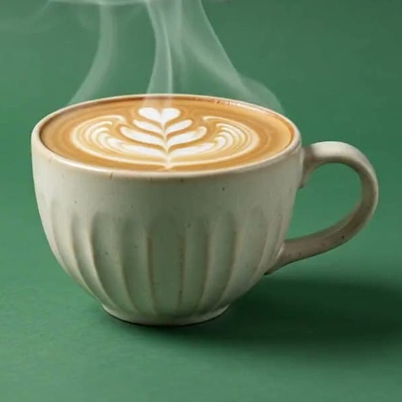 Flat white with fine microfoam in a ceramic cup